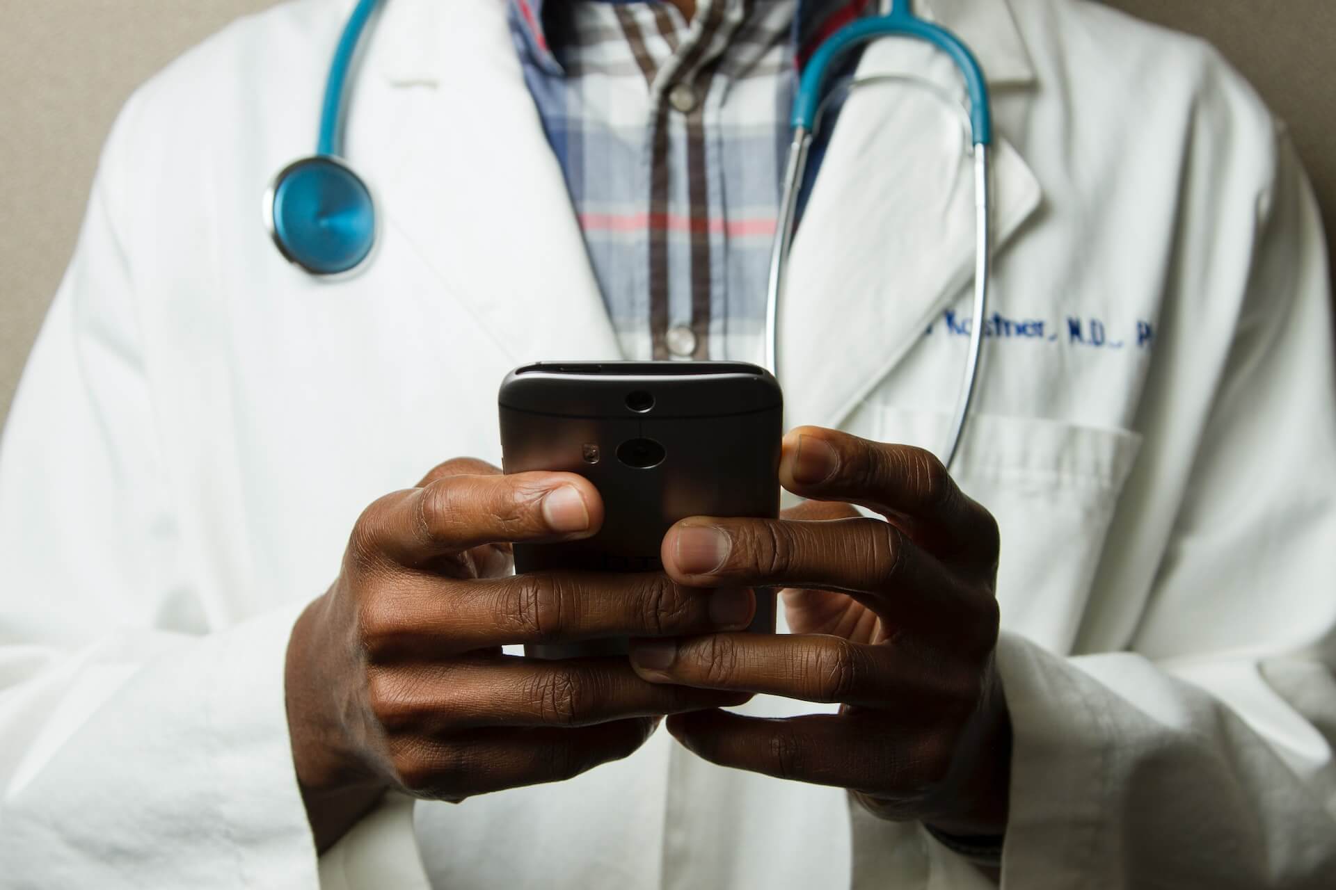 Doctor and mobile phone