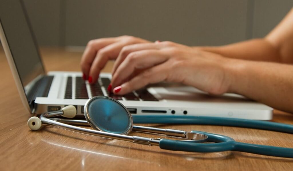 Stethoscope and Laptop Computer