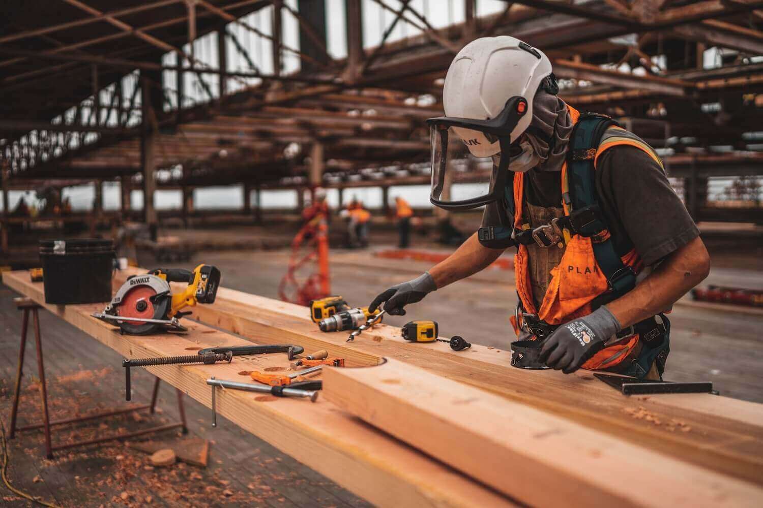 Site worker is handling equipment