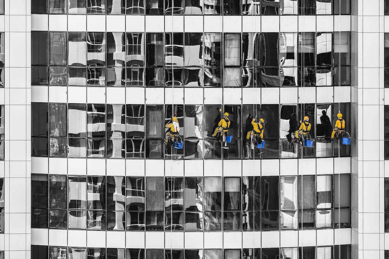 Cleaning windows on a high building