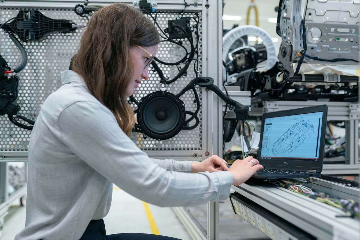 female engineer working on laptop