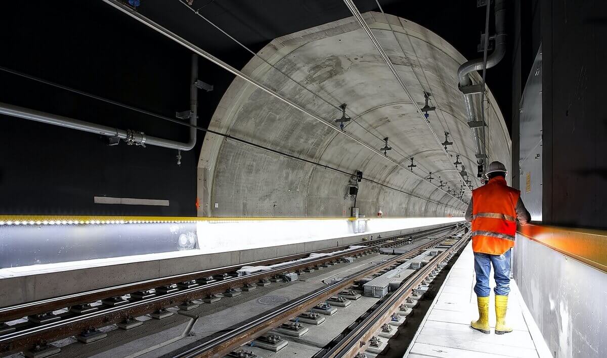 Maintenance worker in a train tunnel