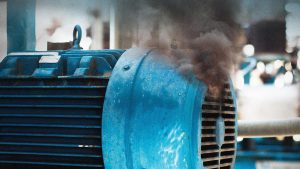 Smoke pouring out of a machine 